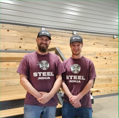 Adam and Caleb wearing Steel Ninja shirts